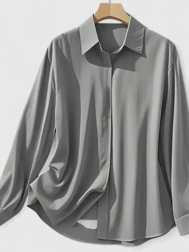 Blouse femme à manches longues avec col pointu et patte de boutonnage dissimulée