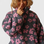 Pull élégant à demi-fermeture éclair et motif floral pour un style sans effort