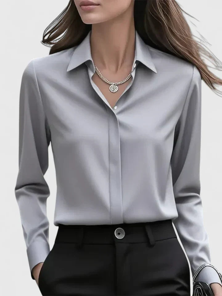 Blouse femme à manches longues avec col pointu et patte de boutonnage dissimulée