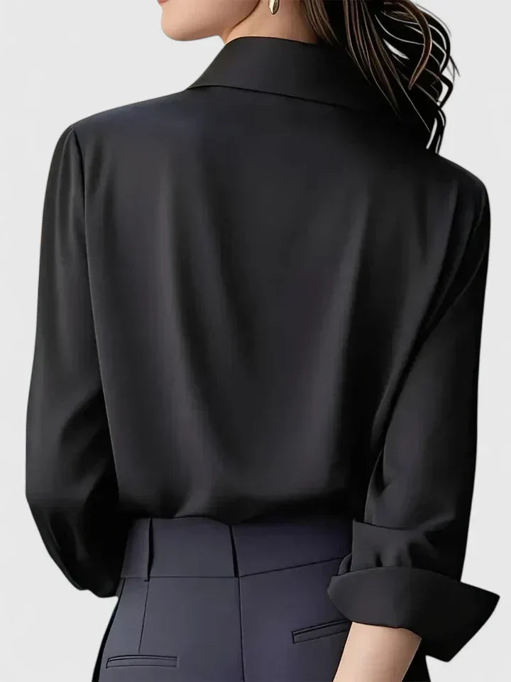 Blouse femme à manches longues avec col pointu et patte de boutonnage dissimulée
