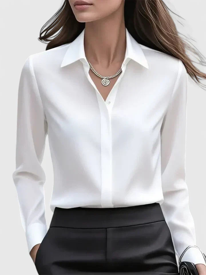 Blouse femme à manches longues avec col pointu et patte de boutonnage dissimulée