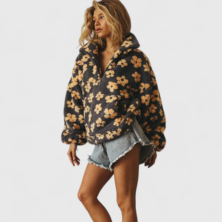 Pull élégant à demi-fermeture éclair et motif floral pour un style sans effort