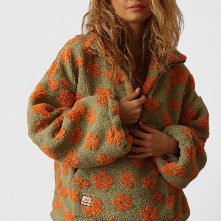 Pull élégant à demi-fermeture éclair et motif floral pour un style sans effort