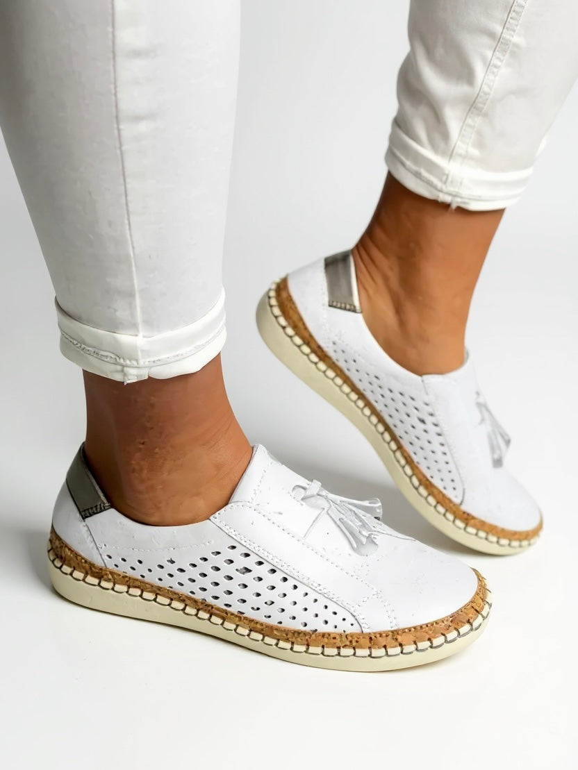 Mocassins à enfiler pour femme avec pompons et semelle rembourrée