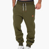 Men's tapered joggers with adjustable elastic waistband and side pockets for versatile wear