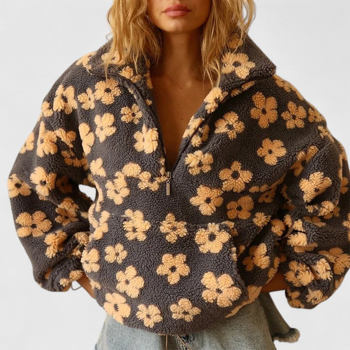 Pull élégant à demi-fermeture éclair et motif floral pour un style sans effort