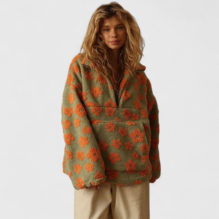 Pull élégant à demi-fermeture éclair et motif floral pour un style sans effort