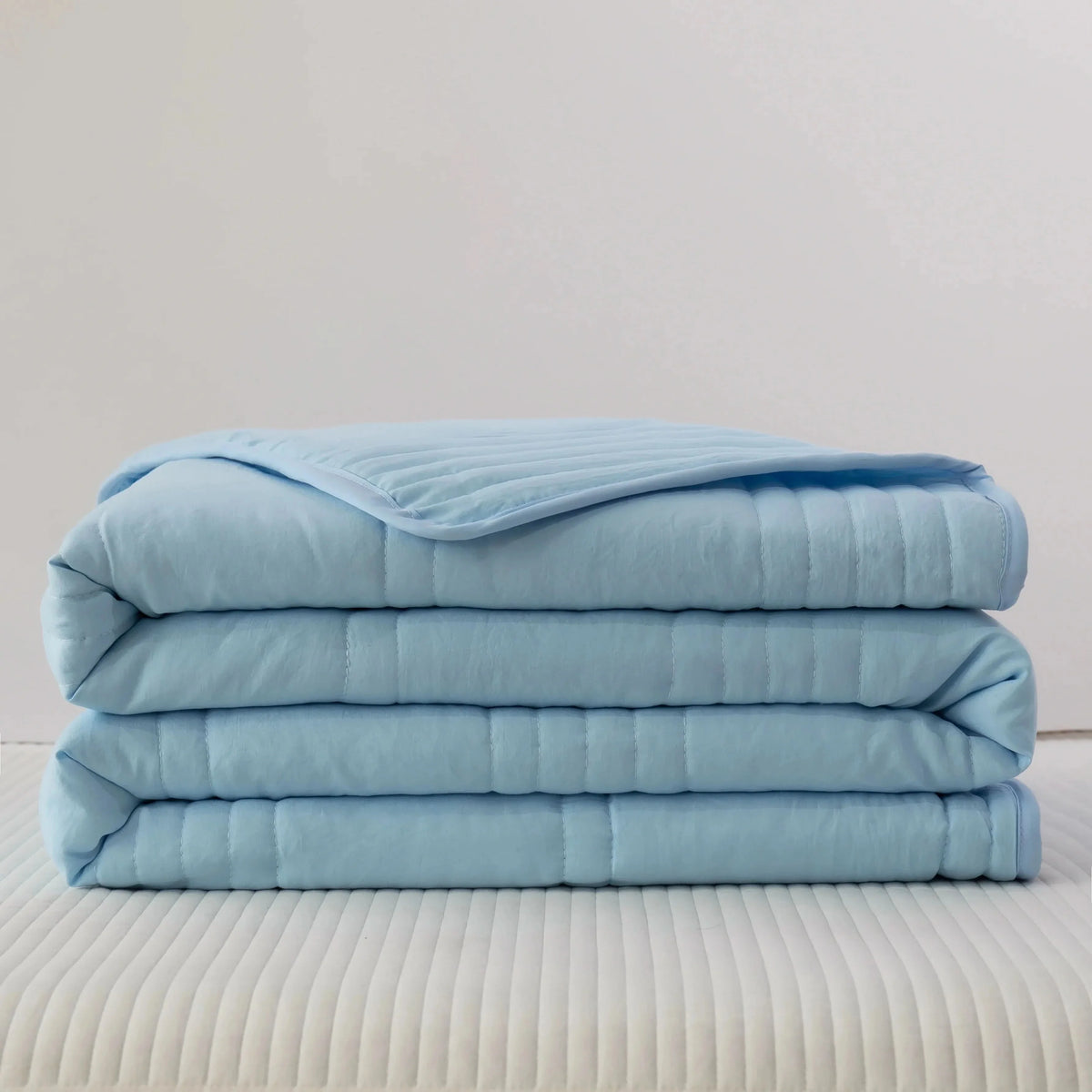 Couverture matelassée légère rafraîchissante pour le confort estival