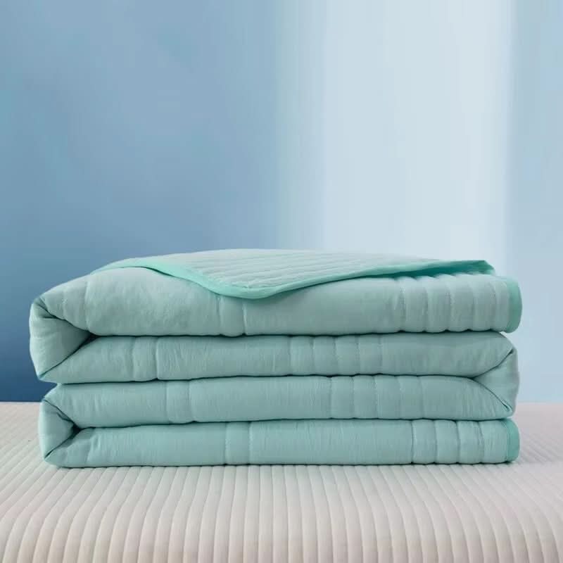 Couverture matelassée légère rafraîchissante pour le confort estival