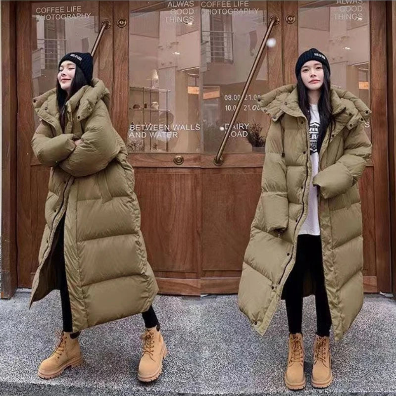 Longue doudoune matelassée isolante pour femme avec capuche – chaleur et style pour l’hiver