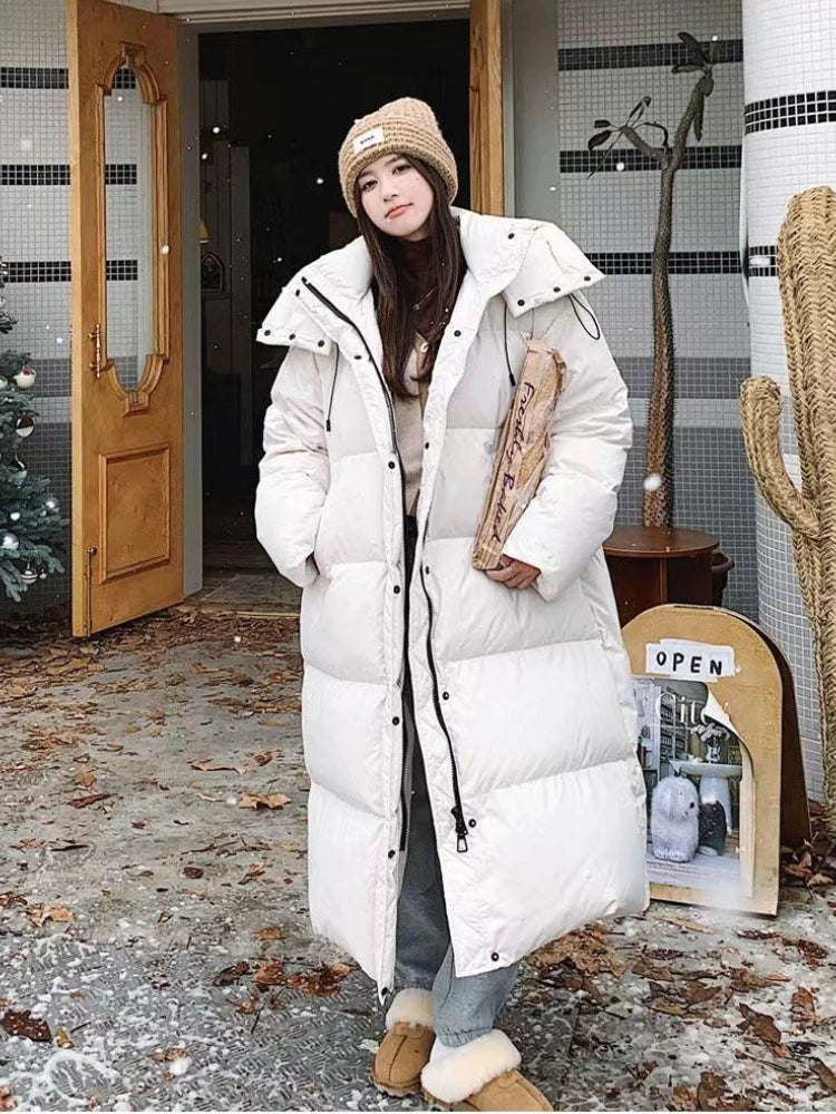 Longue doudoune matelassée isolante pour femme avec capuche – chaleur et style pour l’hiver