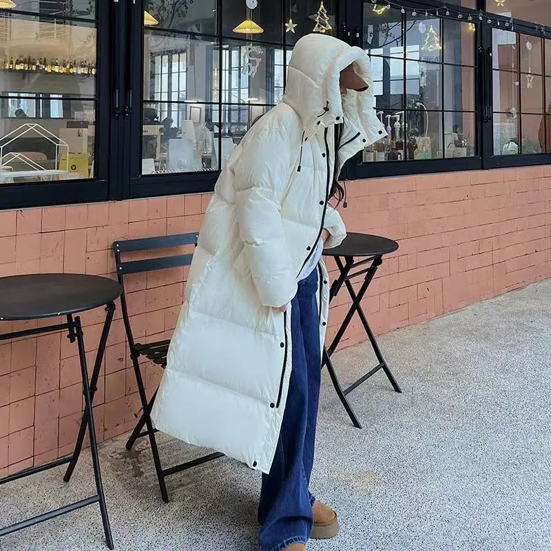 Longue doudoune matelassée isolante pour femme avec capuche – chaleur et style pour l’hiver