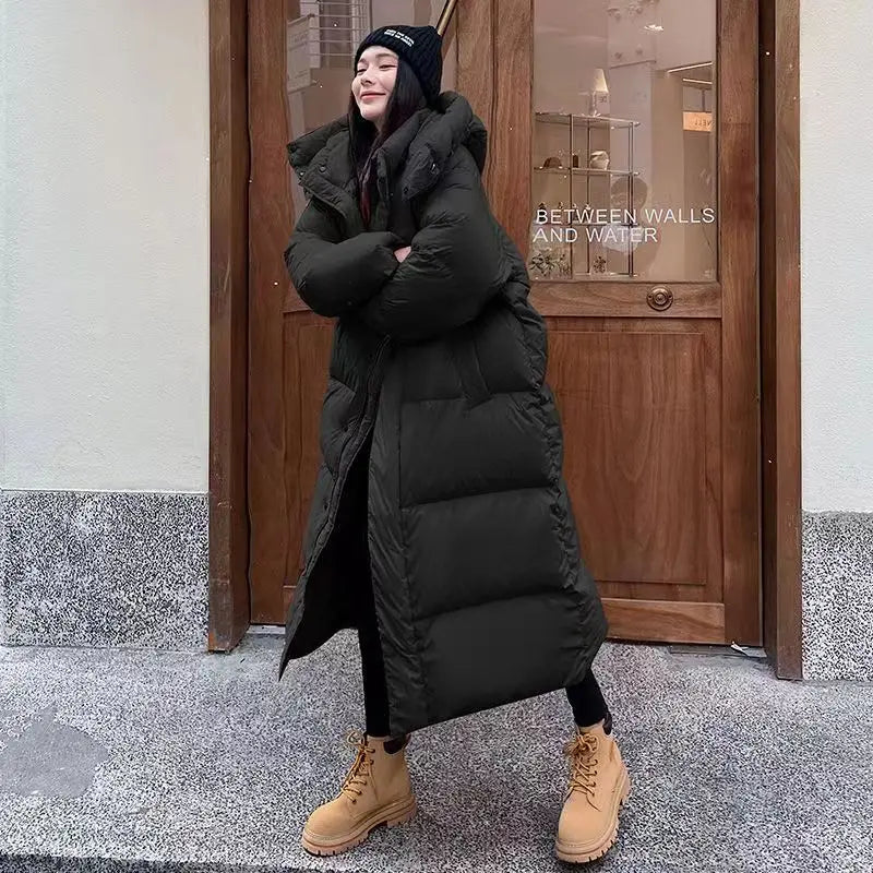 Longue doudoune matelassée isolante pour femme avec capuche – chaleur et style pour l’hiver