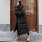 Longue doudoune matelassée isolante pour femme avec capuche – chaleur et style pour l’hiver