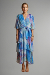 Elegant Women's Maxi Dress with V-Neckline Long Sleeves and Flowing Printed Skirt