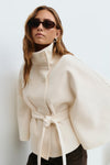 Veste pour femme à col cheminée et manches chauve-souris