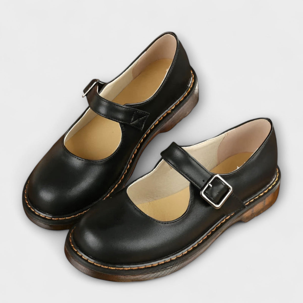 Chaussures femme type babies à bout rond et fermeture à boucle latérale