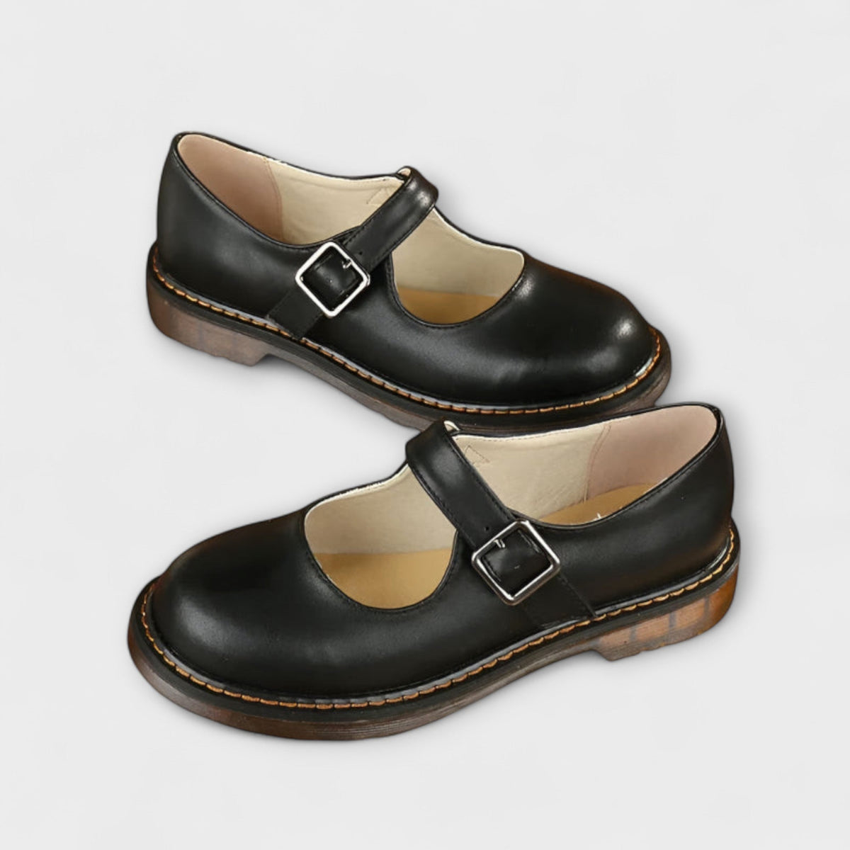 Chaussures femme type babies à bout rond et fermeture à boucle latérale