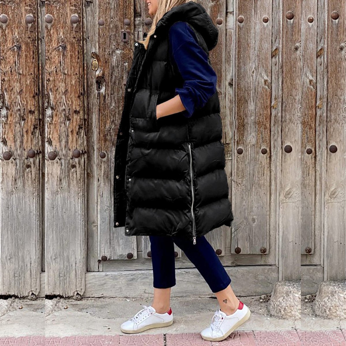 Gilet matelassé long pour femme avec capuche et fermeture éclair sur le devant