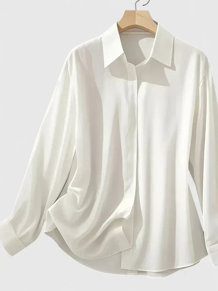 Blouse femme à manches longues avec col pointu et patte de boutonnage dissimulée