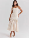 Robe midi élégante à encolure carrée, bretelles larges et jupe évasée à volants