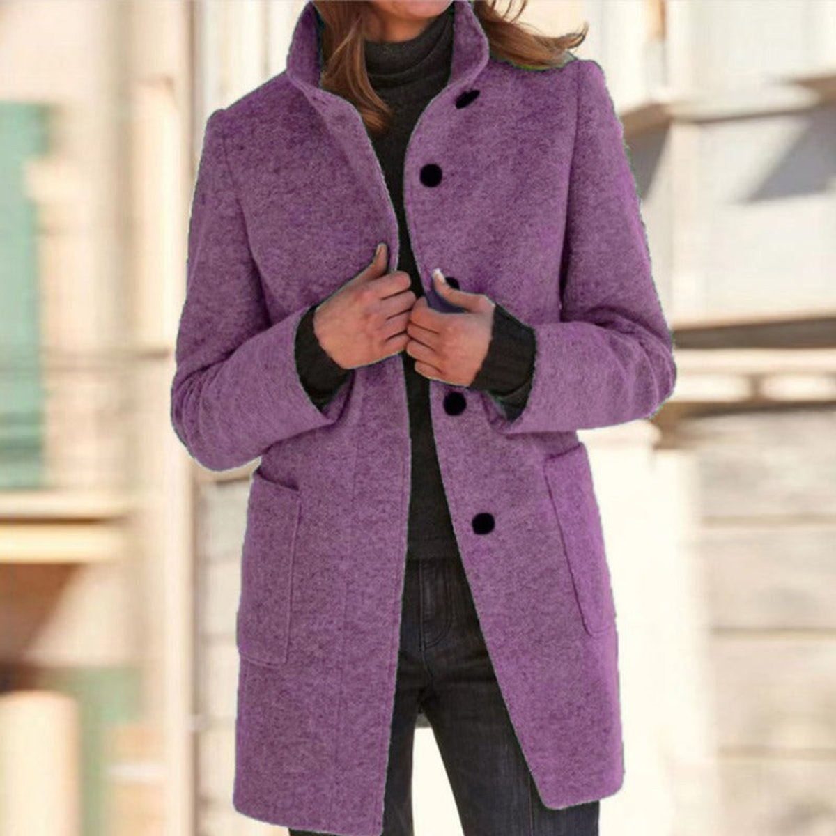 Long manteau pour femme à col montant et fermeture boutonnée
