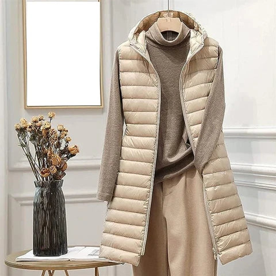 Gilet matelassé pour femme avec capuche et fermeture zippée sur le devant