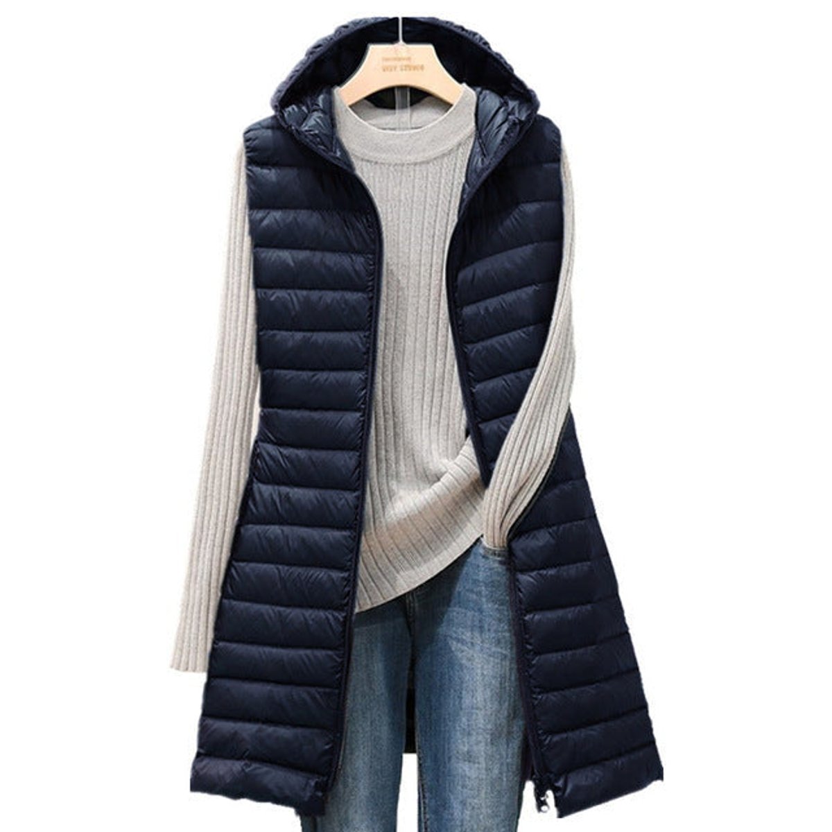 Gilet matelassé pour femme avec capuche et fermeture zippée sur le devant
