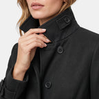 Manteau long pour femme à col montant, boutonnage sur le devant et taille ceinturée