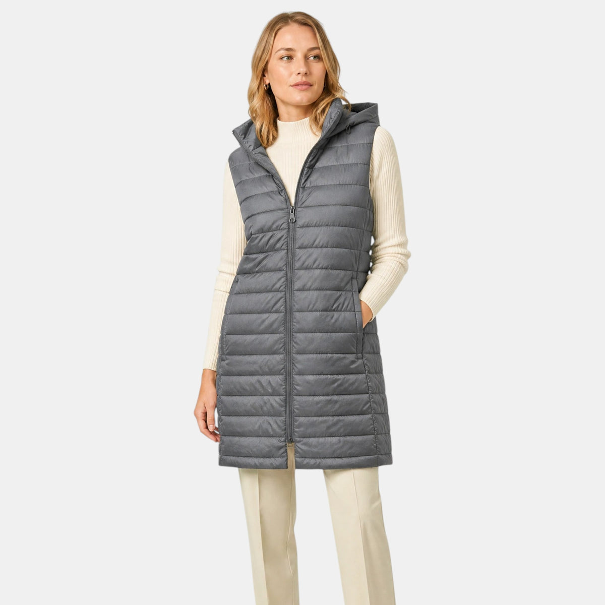 Gilet matelassé pour femme avec capuche et fermeture zippée sur le devant