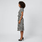 Robe midi portefeuille pour femmes à col en V, lien à nouer à la taille et poches, pour un style sans effort